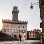 Italy Wedding Packages Cost All Inclusive, a wedding couple in a typical piazza in Italy