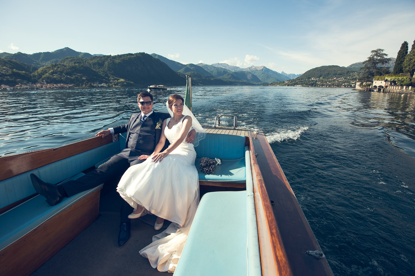 newlyweds on boat trip at Lake orta wedding