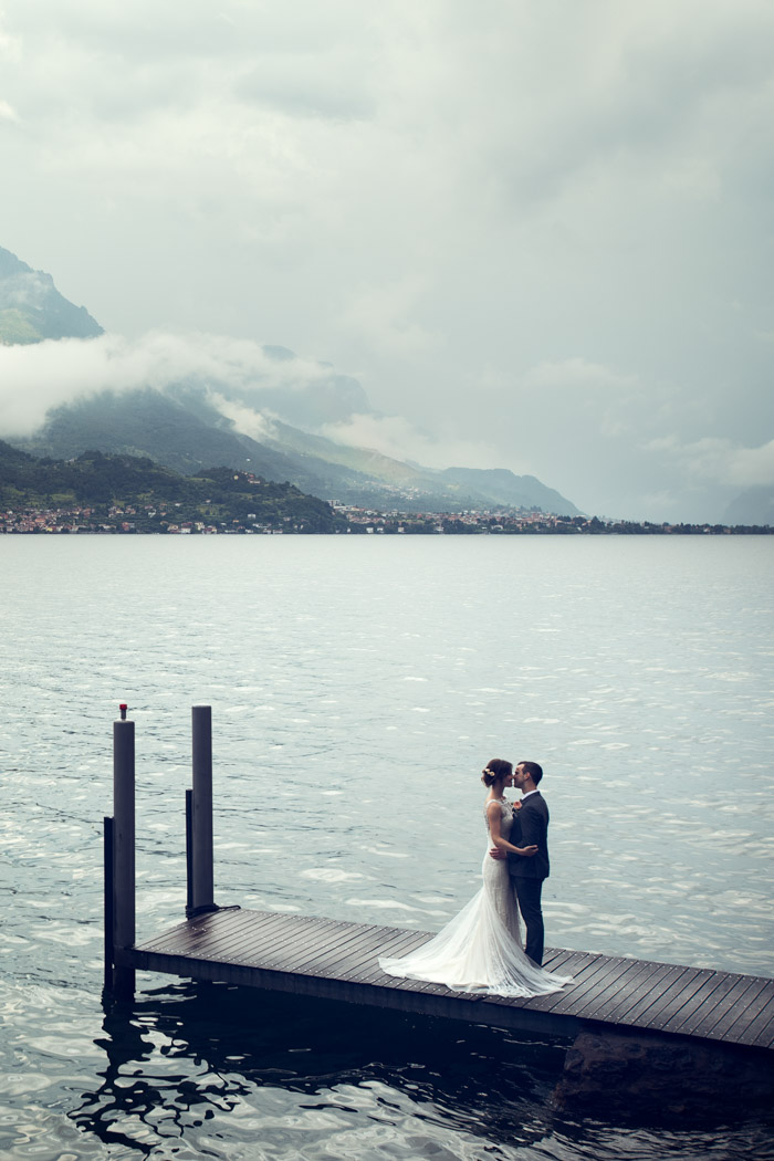 Lake Como wedding photographer, Villa Aura del lago bride and groom on the jetty