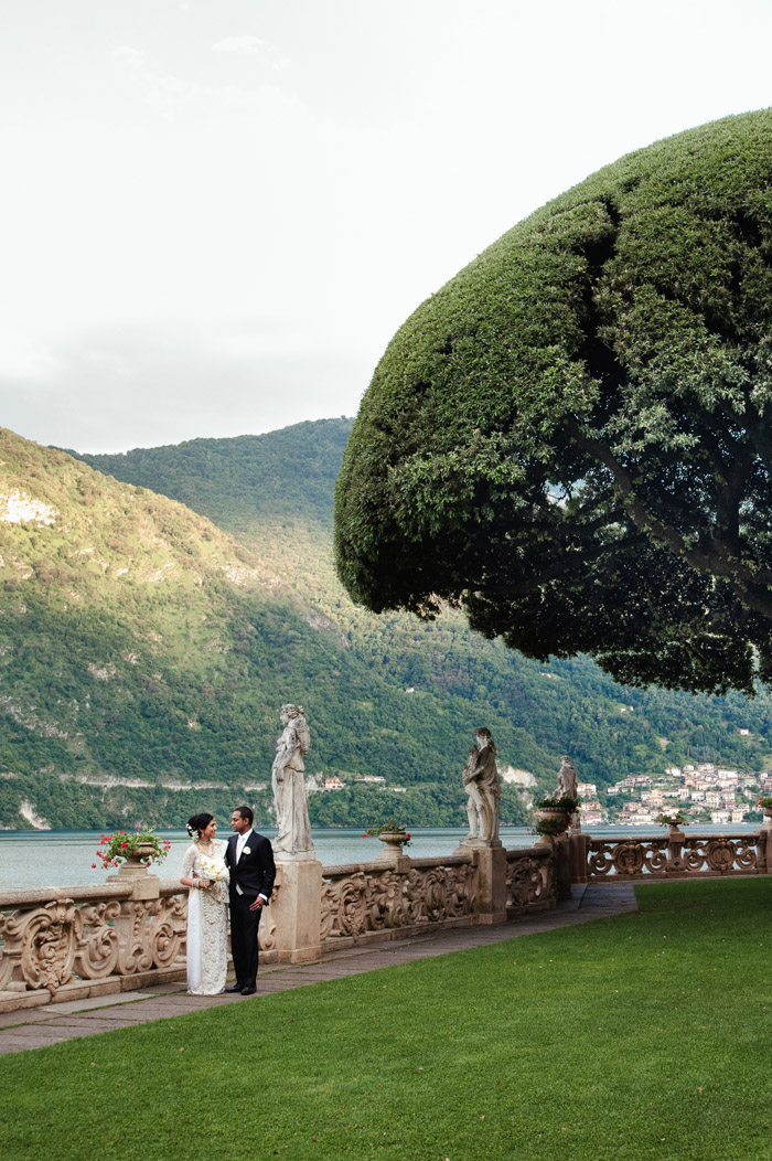 Villa del Balbianello, lake Como wedding, bride and groom in the garden with lake Como and Alps